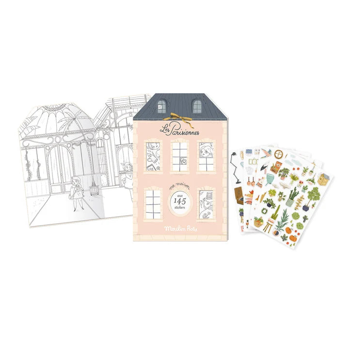 A stationery gift set featuring a pastel pink house-shaped card labeled 'La Couronne' and 'Maison Pig', shown with a black-and-white architectural line-art sheet and a fan of colorful decorative stickers on a white background.