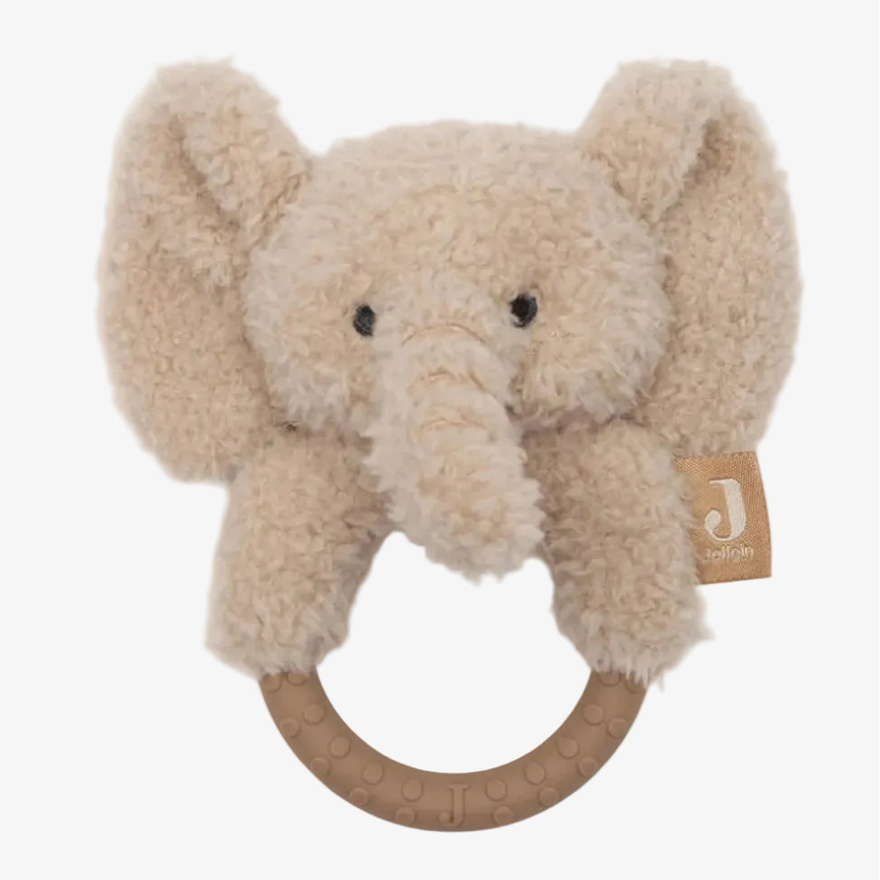 Plush elephant rattle with a wooden ring on a white background